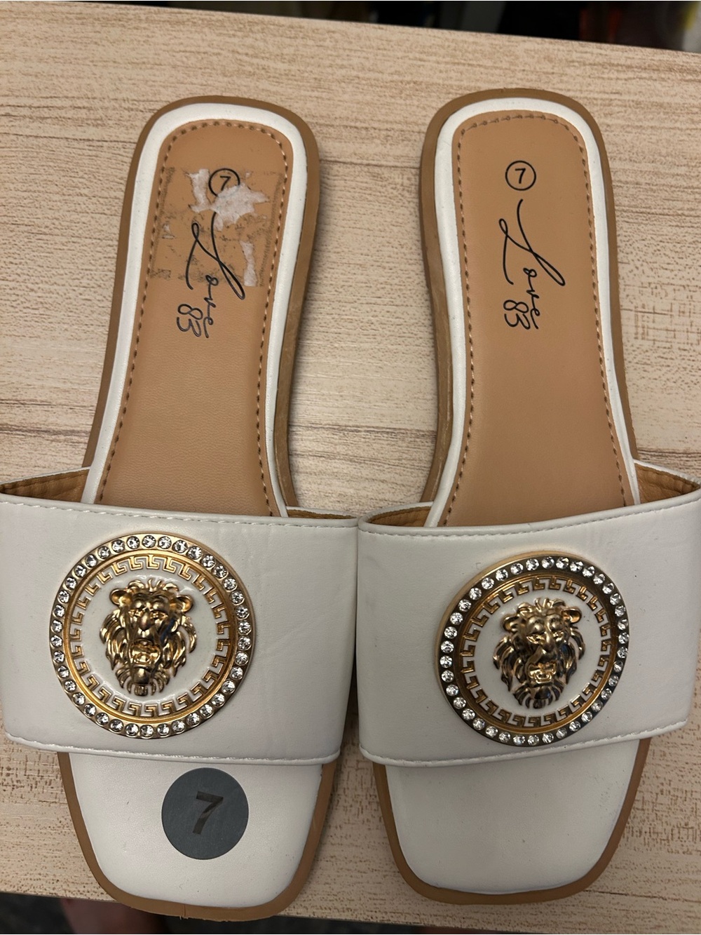White Embellished Slide Mules with Gold Lion Medallion